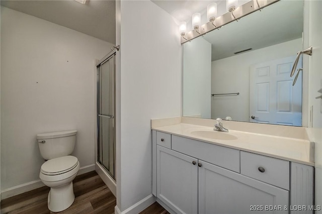 893 Winetavern Rd, Osage Beach, MO 65065 - full bathroom with wood finished floors, vanity, and an enclosed shower