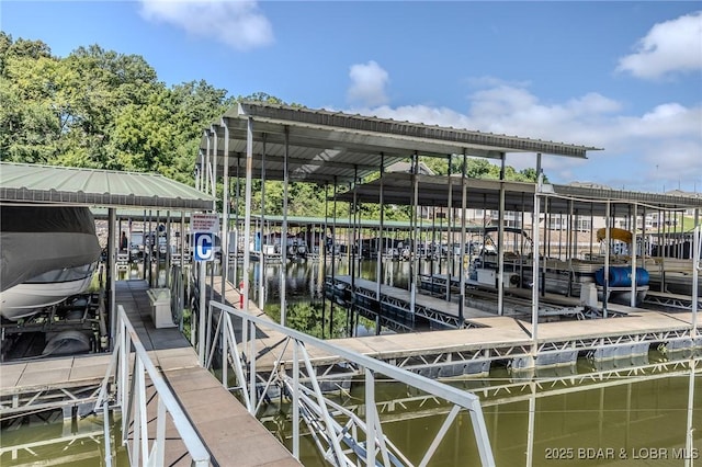 893 Winetavern Rd, Osage Beach, MO 65065 - dock area featuring boat lift and a water view