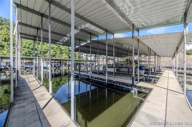 893 Winetavern Rd, Osage Beach, MO 65065 - dock with boat lift and a water view