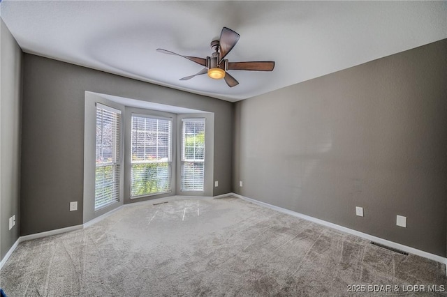 893 Winetavern Rd, Osage Beach, MO 65065 - carpeted spare room featuring a ceiling fan and baseboards