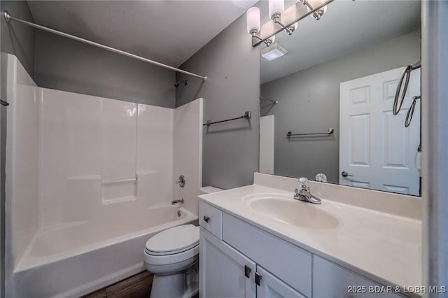 893 Winetavern Rd, Osage Beach, MO 65065 - bathroom featuring vanity, bathtub / shower combination, and wood finished floors