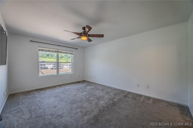 893 Winetavern Rd, Osage Beach, MO 65065 - empty room featuring a ceiling fan and carpet