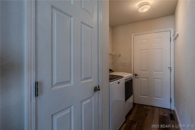 893 Winetavern Rd, Osage Beach, MO 65065 - laundry area featuring independent washer and dryer and dark wood-style floors