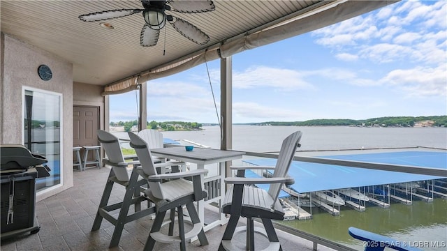 1230 Lands End Pkwy Unit 304, Osage Beach, MO 65065 - view of patio featuring grilling area, a water view, and a ceiling fan