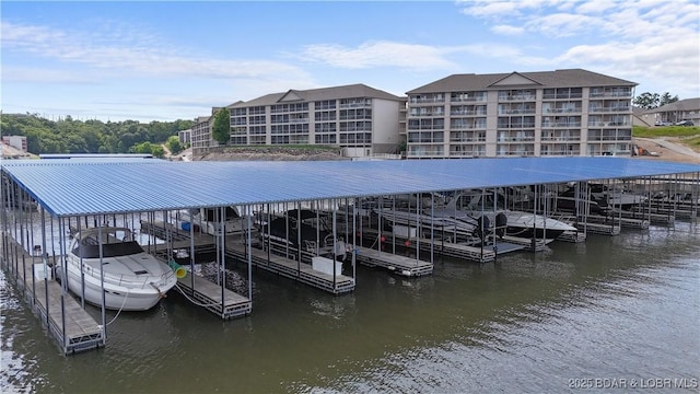 1230 Lands End Pkwy Unit 304, Osage Beach, MO 65065 - dock area featuring a water view and boat lift