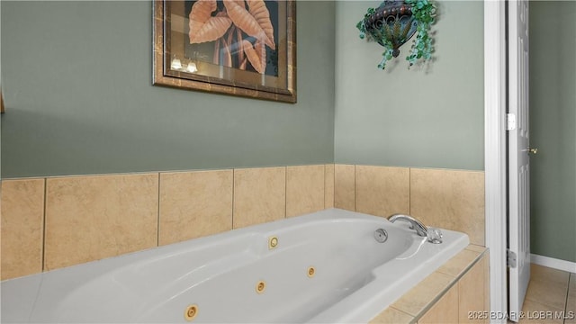1230 Lands End Pkwy Unit 304, Osage Beach, MO 65065 - full bath with a tub with jets and tile patterned flooring