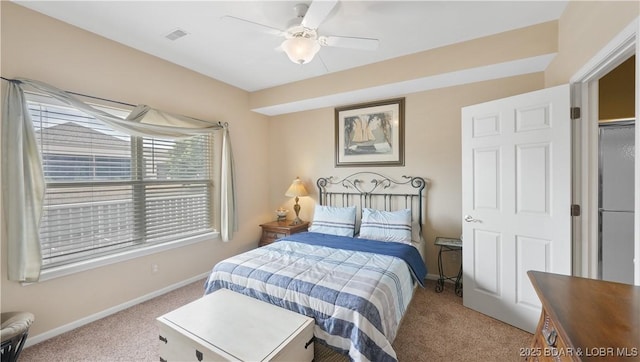 1230 Lands End Pkwy Unit 304, Osage Beach, MO 65065 - carpeted bedroom with baseboards and ceiling fan