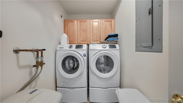 1230 Lands End Pkwy Unit 304, Osage Beach, MO 65065 - washroom featuring cabinet space, washer and clothes dryer, and electric panel