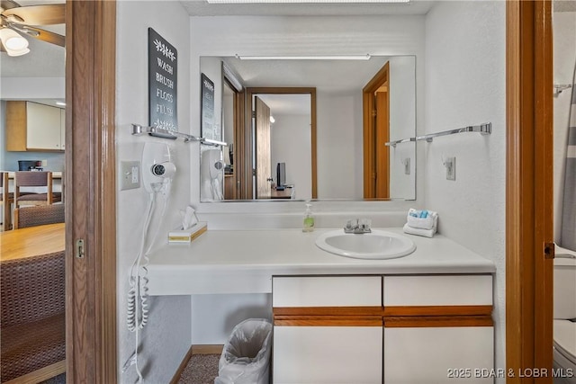278 Lone Oak Pt Unit 18, Sunrise Beach, MO 65079 - bathroom with vanity and ceiling fan