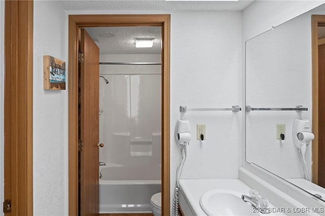 278 Lone Oak Pt Unit 18, Sunrise Beach, MO 65079 - bathroom with a textured ceiling, vanity, and  shower combination