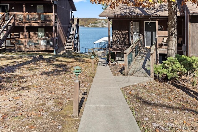 278 Lone Oak Pt Unit 18, Sunrise Beach, MO 65079 - dock featuring stairs and a water view