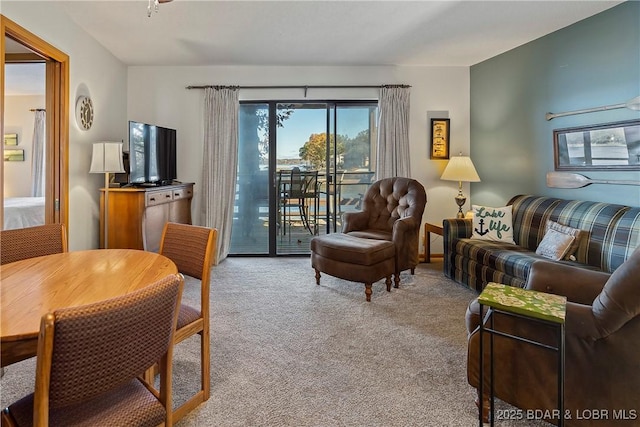 278 Lone Oak Pt Unit 18, Sunrise Beach, MO 65079 - carpeted living room featuring a ceiling fan