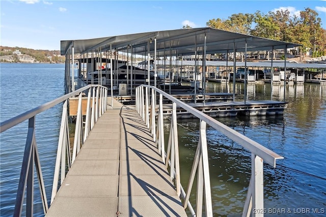 278 Lone Oak Pt Unit 18, Sunrise Beach, MO 65079 - dock with a water view and boat lift