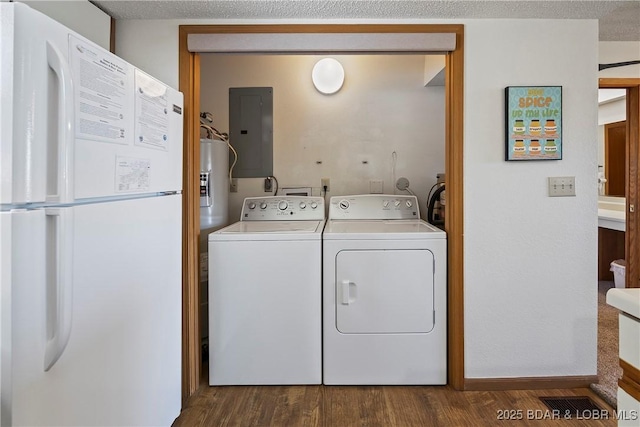 278 Lone Oak Pt Unit 18, Sunrise Beach, MO 65079 - laundry area featuring electric panel, washer and dryer, and dark wood-style flooring