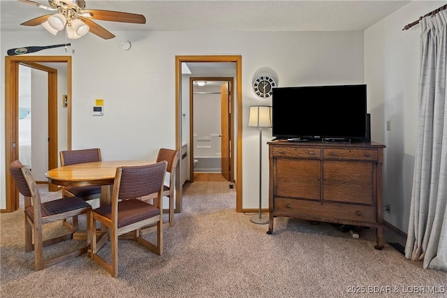 278 Lone Oak Pt Unit 18, Sunrise Beach, MO 65079 - dining room featuring light colored carpet and a ceiling fan