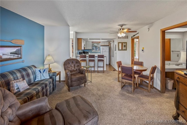 278 Lone Oak Pt Unit 18, Sunrise Beach, MO 65079 - living room featuring light carpet and ceiling fan
