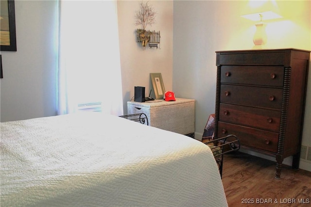 891 Azalea Ct, Osage Beach, MO 65065 - bedroom featuring wood finished floors