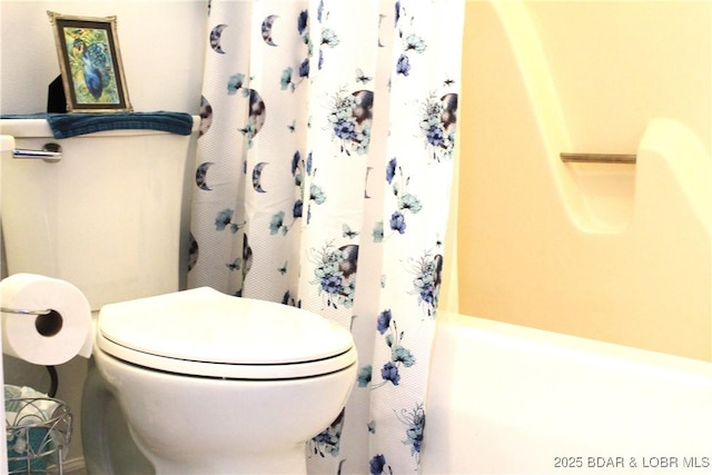 891 Azalea Ct, Osage Beach, MO 65065 - bathroom with a shower with shower curtain and toilet