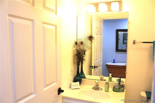 891 Azalea Ct, Osage Beach, MO 65065 - bathroom featuring vanity and toilet