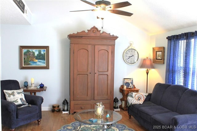 891 Azalea Ct, Osage Beach, MO 65065 - living area with ceiling fan, vaulted ceiling, and wood finished floors