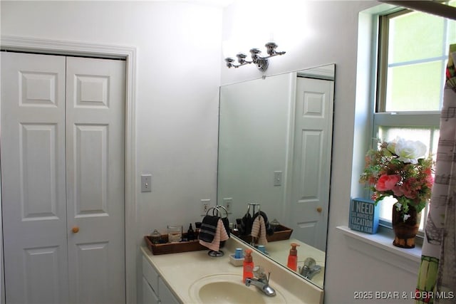 891 Azalea Ct, Osage Beach, MO 65065 - bathroom with vanity and a closet