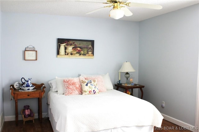 891 Azalea Ct, Osage Beach, MO 65065 - bedroom with dark wood-type flooring and ceiling fan