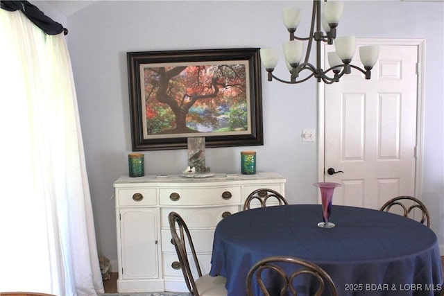 891 Azalea Ct, Osage Beach, MO 65065 - dining area with a chandelier