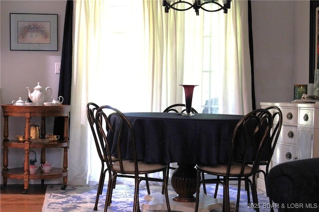 891 Azalea Ct, Osage Beach, MO 65065 - dining room with a chandelier and wood finished floors