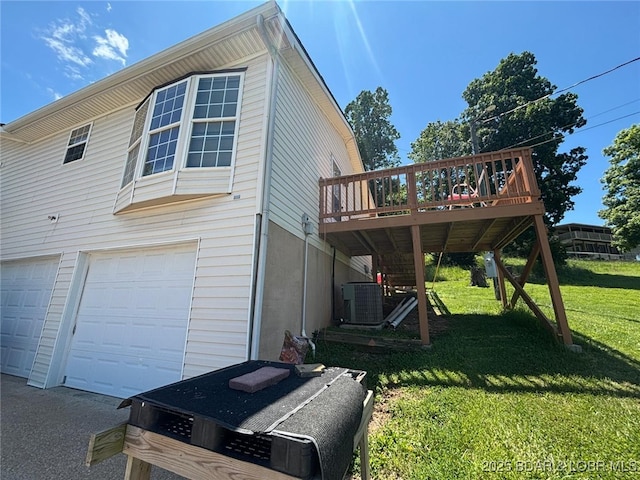 17362 Country Life Rd, Gravois Mills, MO 65037 - view of side of property with a garage, a yard, and a wooden deck