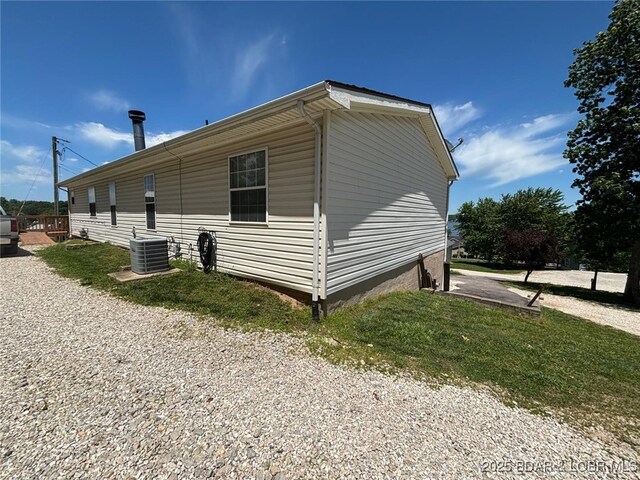 17362 Country Life Rd, Gravois Mills, MO 65037 - view of side of property featuring a central air condition unit