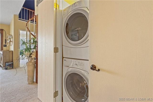 2500 Bay Point Ln Unit 444, Osage Beach, MO 65065 - laundry area with stacked washer / drying machine and carpet