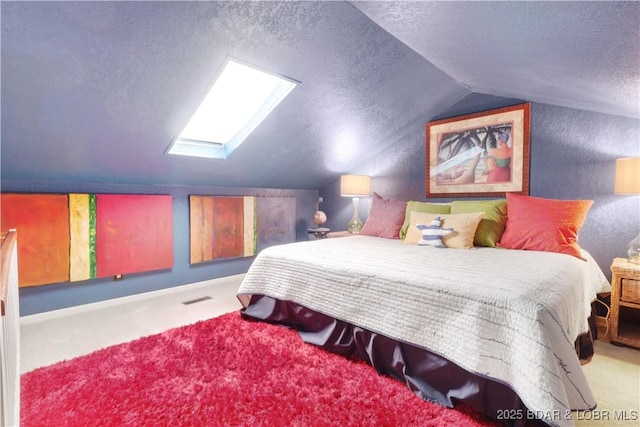2500 Bay Point Ln Unit 444, Osage Beach, MO 65065 - carpeted bedroom featuring lofted ceiling, a skylight, and a textured ceiling