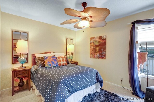 2500 Bay Point Ln Unit 444, Osage Beach, MO 65065 - bedroom with carpet floors and ceiling fan