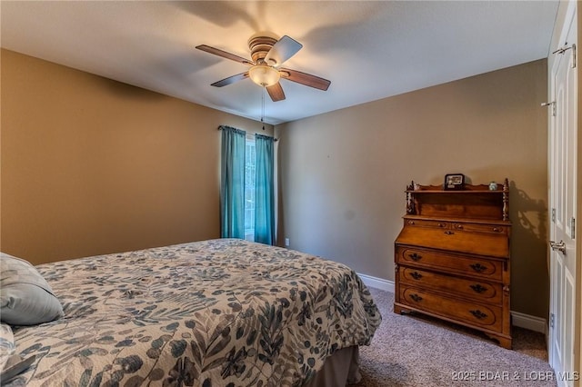326 Bloomington Dr, Four Seasons, MO 65049 - carpeted bedroom with baseboards and a ceiling fan