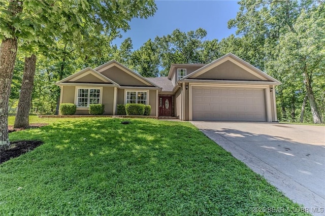 326 Bloomington Dr, Four Seasons, MO 65049 - view of front facade featuring a garage, driveway, and a front yard