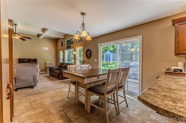 326 Bloomington Dr, Four Seasons, MO 65049 - dining space featuring beam ceiling, a ceiling fan, coffered ceiling, and light tile patterned flooring