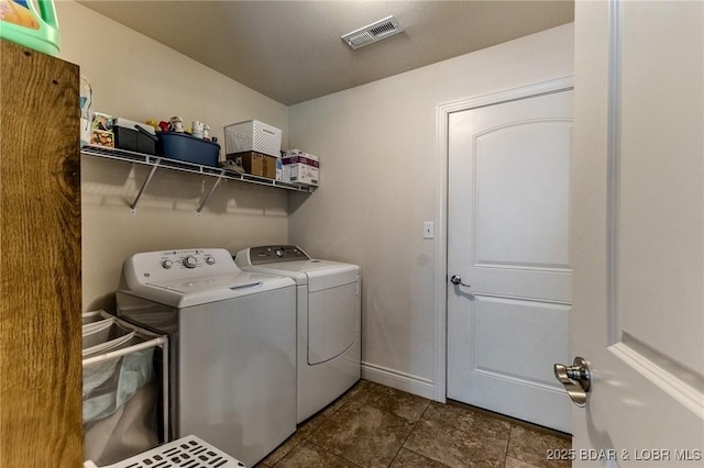 326 Bloomington Dr, Four Seasons, MO 65049 - washroom featuring washer and dryer and baseboards