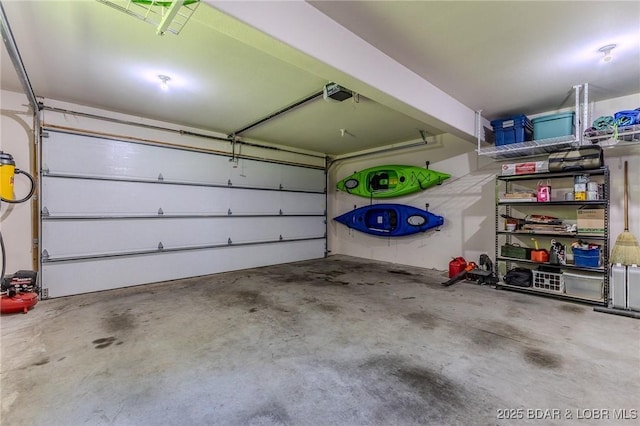 326 Bloomington Dr, Four Seasons, MO 65049 - garage featuring a garage door opener