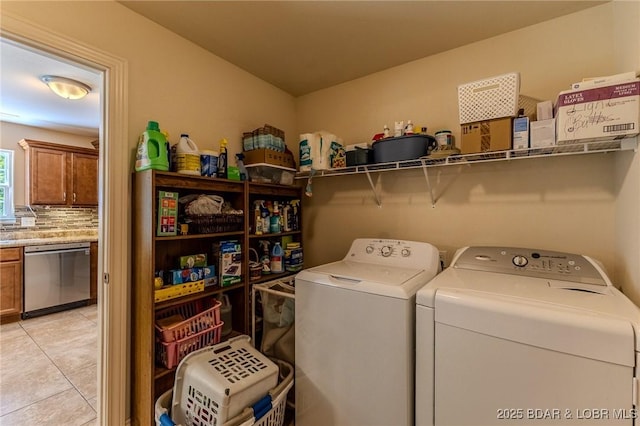 326 Bloomington Dr, Four Seasons, MO 65049 - laundry area with washing machine and clothes dryer and light tile patterned flooring
