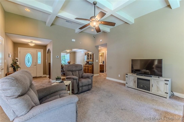 326 Bloomington Dr, Four Seasons, MO 65049 - carpeted living room featuring arched walkways, a ceiling fan, beam ceiling, coffered ceiling, and recessed lighting