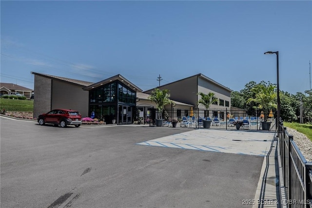 326 Bloomington Dr, Four Seasons, MO 65049 - view of building exterior featuring uncovered parking