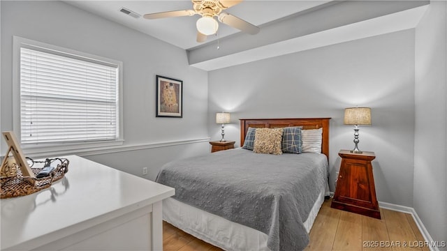 54 Palisades Lakeview Dr Unit 1B, Lake Ozark, MO 65049 - bedroom featuring light wood finished floors and ceiling fan