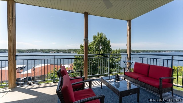 54 Palisades Lakeview Dr Unit 1B, Lake Ozark, MO 65049 - patio / terrace featuring a water view and outdoor lounge area