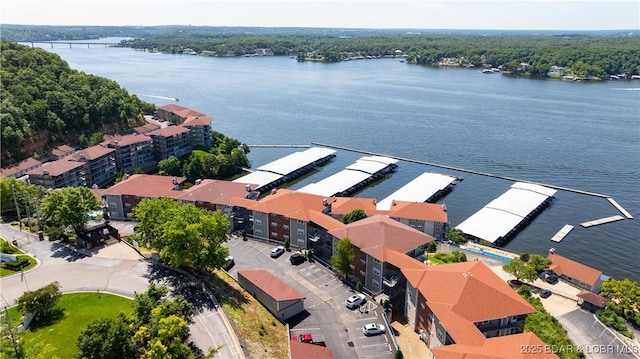 54 Palisades Lakeview Dr Unit 1B, Lake Ozark, MO 65049 - drone / aerial view of a large body of water and apartment complex / building