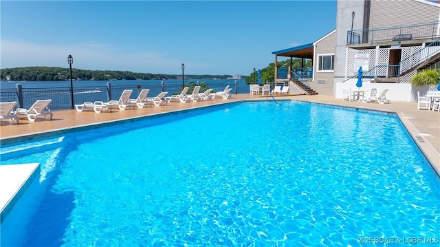 54 Palisades Lakeview Dr Unit 1B, Lake Ozark, MO 65049 - community pool with stairway and a patio