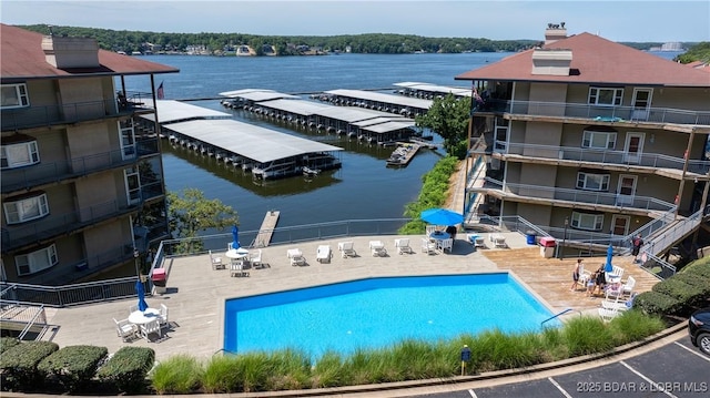 54 Palisades Lakeview Dr Unit 1B, Lake Ozark, MO 65049 - community pool with a water view and a patio area