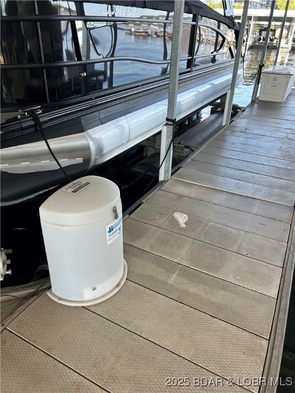 54 Palisades Lakeview Dr Unit 1B, Lake Ozark, MO 65049 - dock area with boat lift