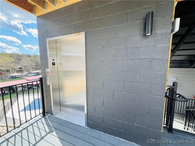 295 Highland Shores Dr Unit 1A, Lake Ozark, MO 65049 - balcony with elevator