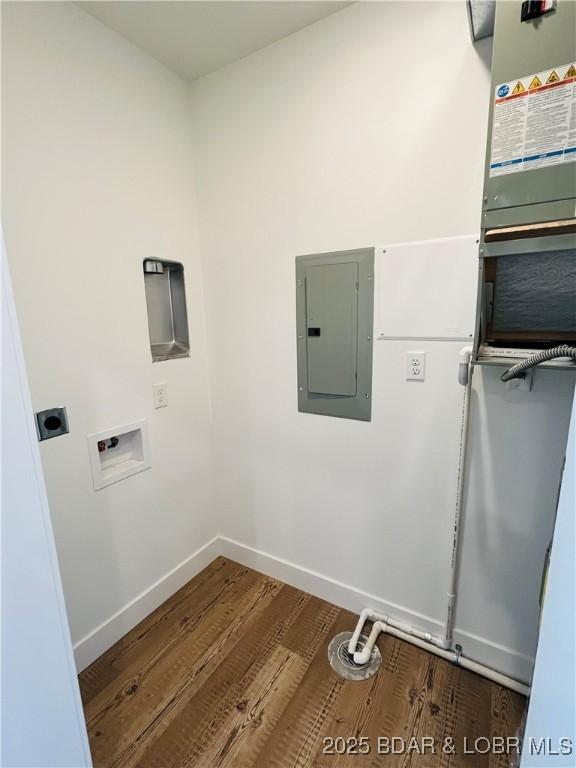 295 Highland Shores Dr Unit 1A, Lake Ozark, MO 65049 - laundry area with electric panel, hookup for an electric dryer, washer hookup, and wood finished floors