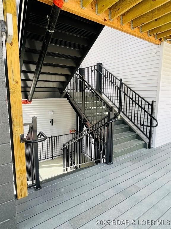 295 Highland Shores Dr Unit 5F, Lake Ozark, MO 65049 - wooden terrace with stairway